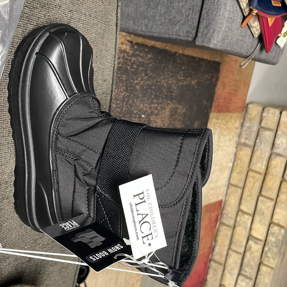 Youth size 13 snow boots black Velcro closure lined inside for warmth